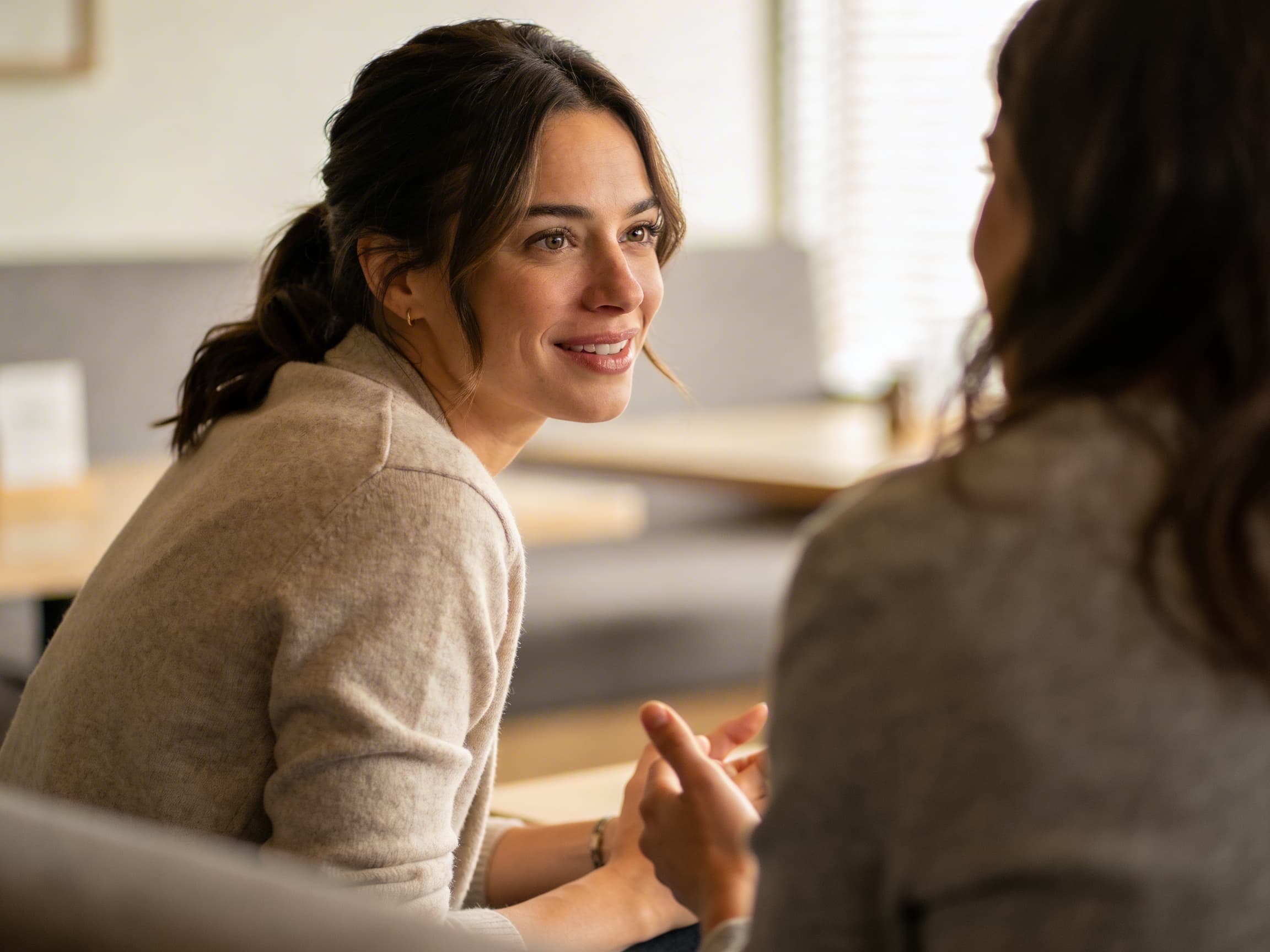 Person listening carefully in a conversation